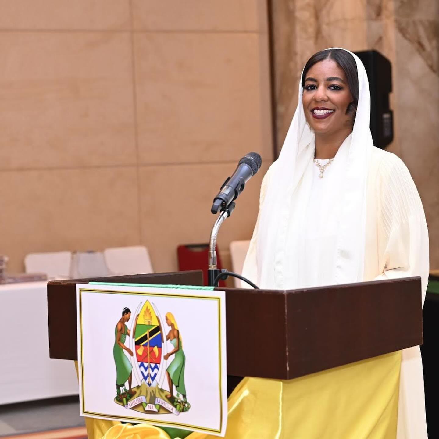 Asma hosting at the podium