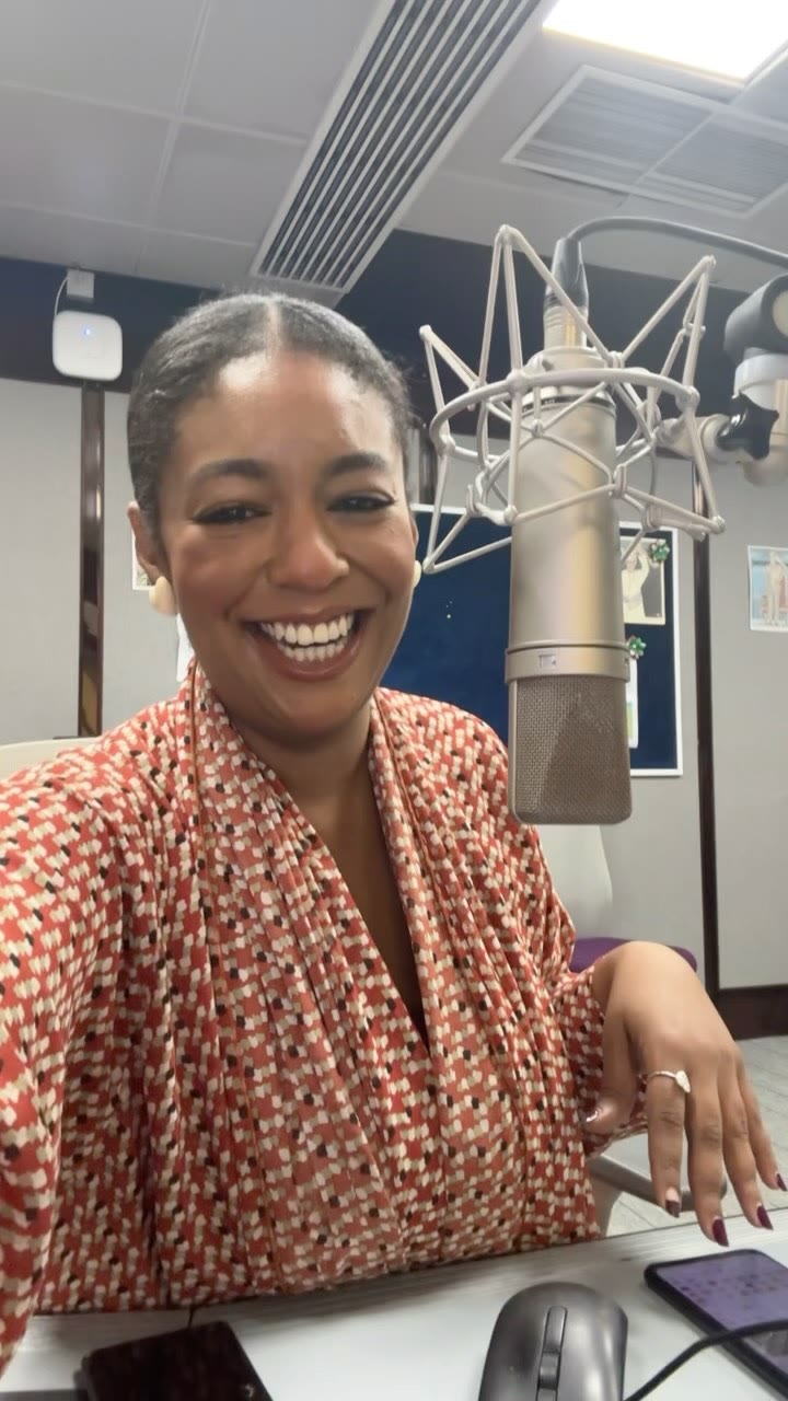 Asma smiling in the studio